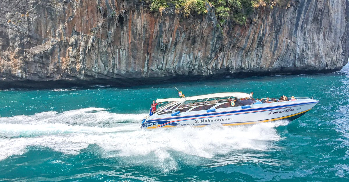 144hr Chinese Exemption - Cruising Tianjin to Shanghai? - White and Blue Boat on Sea Near Brown Rock Formation