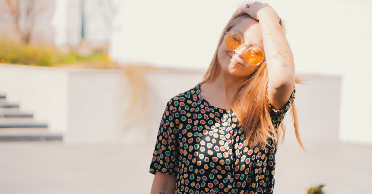 15 days vacations nature oriented in Quebec [closed] - Cheerful young woman with eyes closed enjoying sun