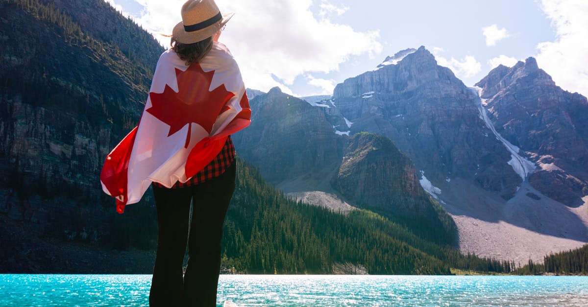 17 to canada and back [duplicate] - Photo of Woman Wearing Sun Hat