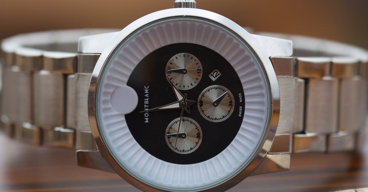 1 hour 10 minute layover in Addis Ababa? - Silver and White Round Chronograph Watch