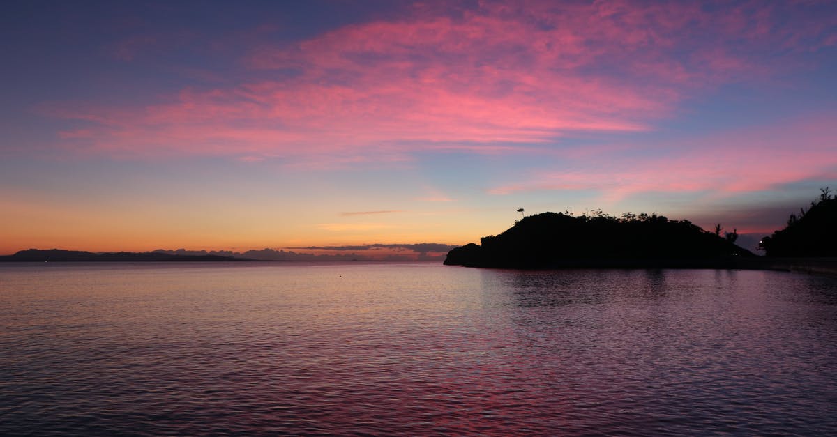 20-hr layover in Japan - Silhouette of Island during Sunset