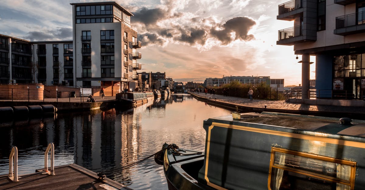 2 hours layover and 2 separate flights - London Luton - Boat on a Dock in an Urban City