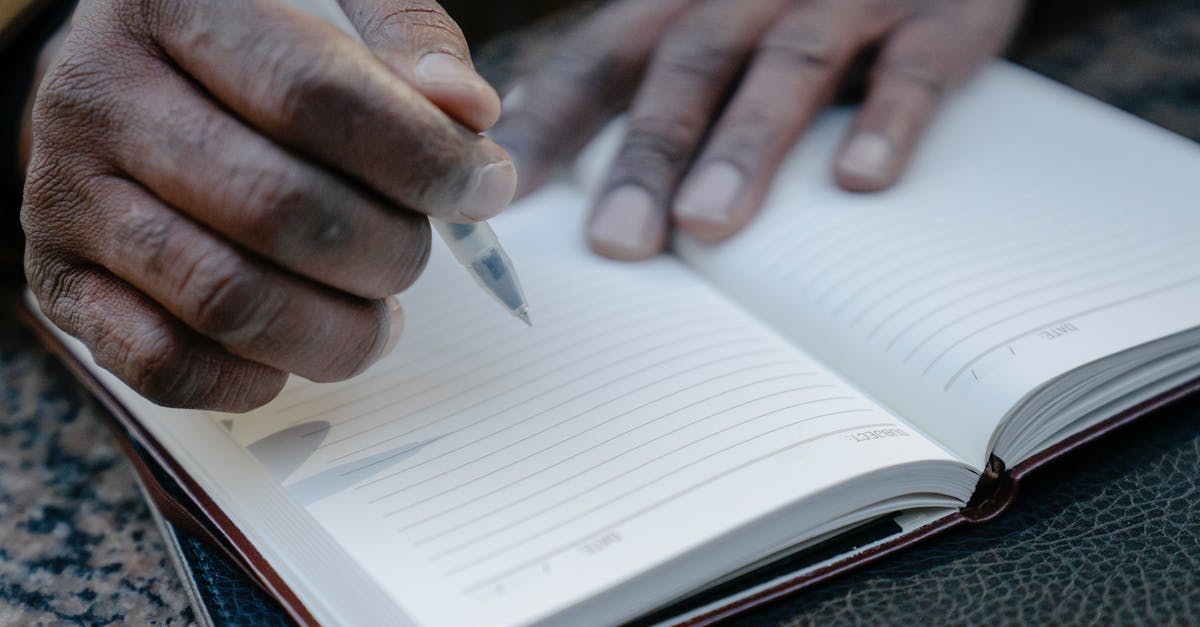 3D Pen in hand luggage - Person Writing on a Notebook