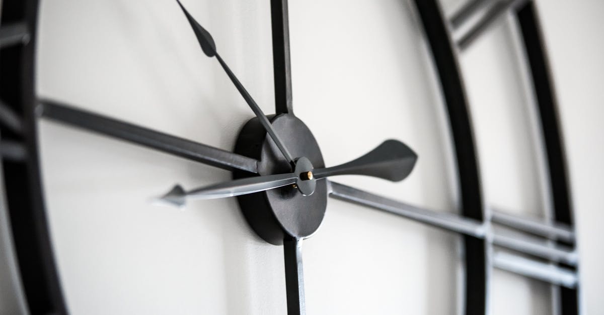 50 Minute Domestic Delta Layover in LAX - Modern clock on white wall