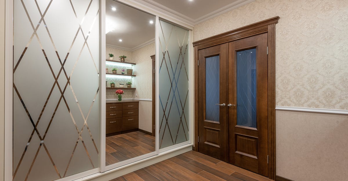 55-floors residential blocks next to the airport - Brown Wooden Door With Glass Panel