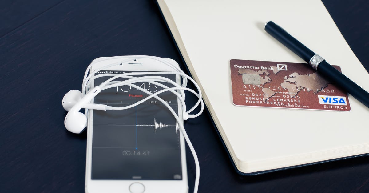 90-day Visa Waiver for Australian - Silver Iphone 6 Beside Red Visa Card