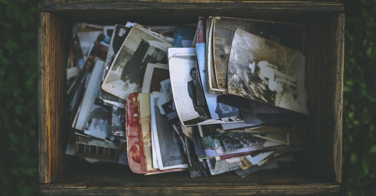 A photo on an old software package box - Old photos in the wooden box