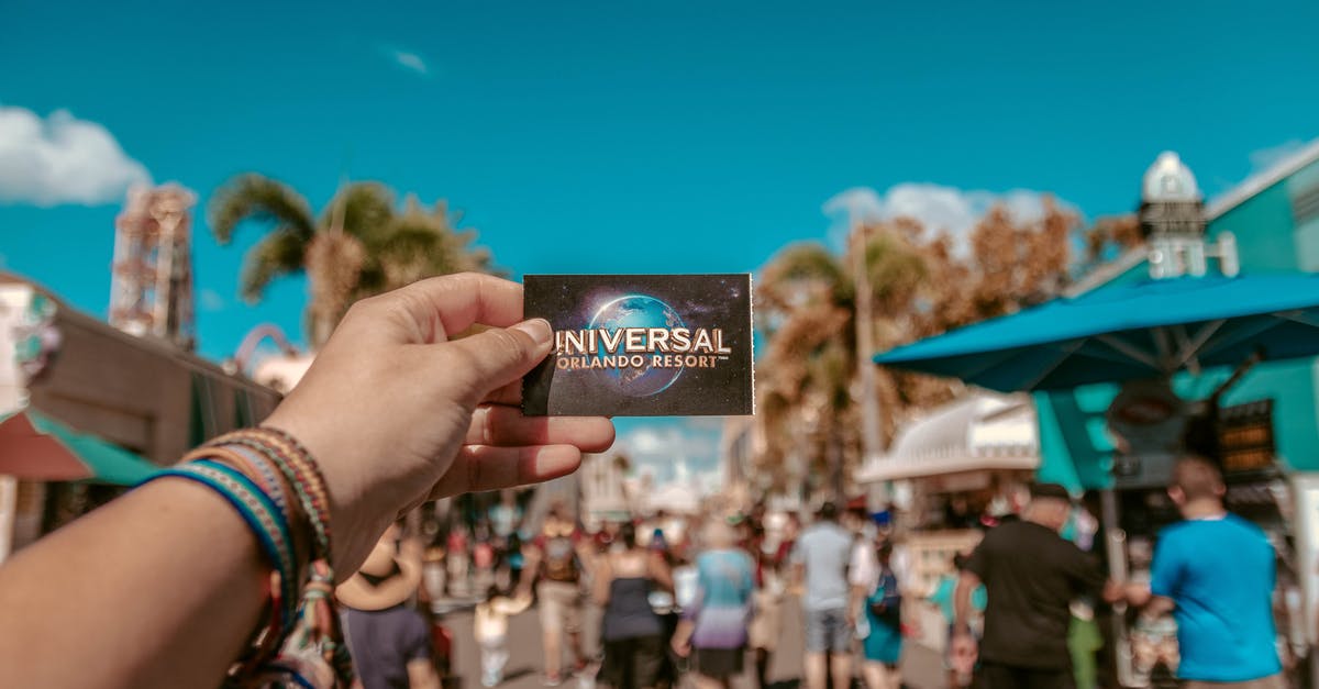 A ticket or a receipt? - Person Holding Universal Studios Ticket