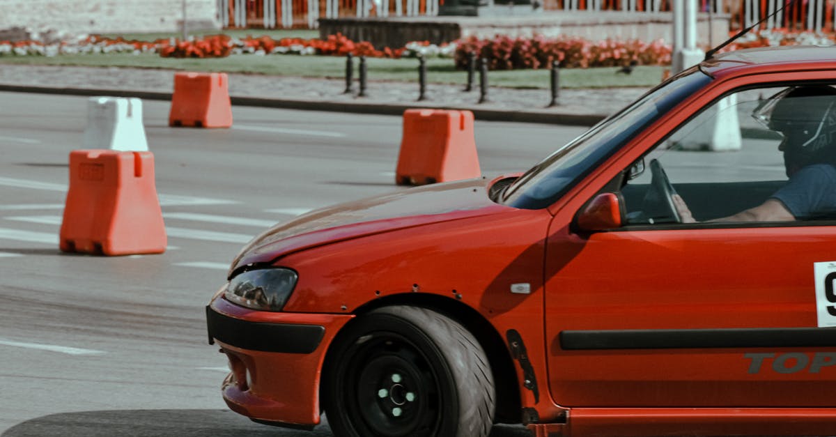 a weird "no turn on red" traffic ticket [closed] - Old fashioned rally car in city