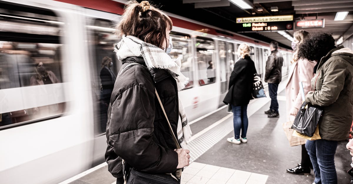 About canceled trains in France - People Standing on Subway Platform