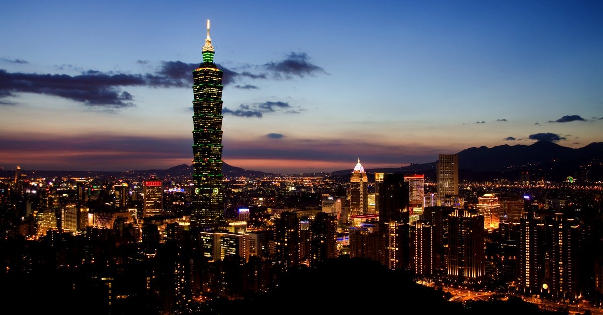 About travel to Taiwan and exchange [closed] - City Buildings during Nighttime