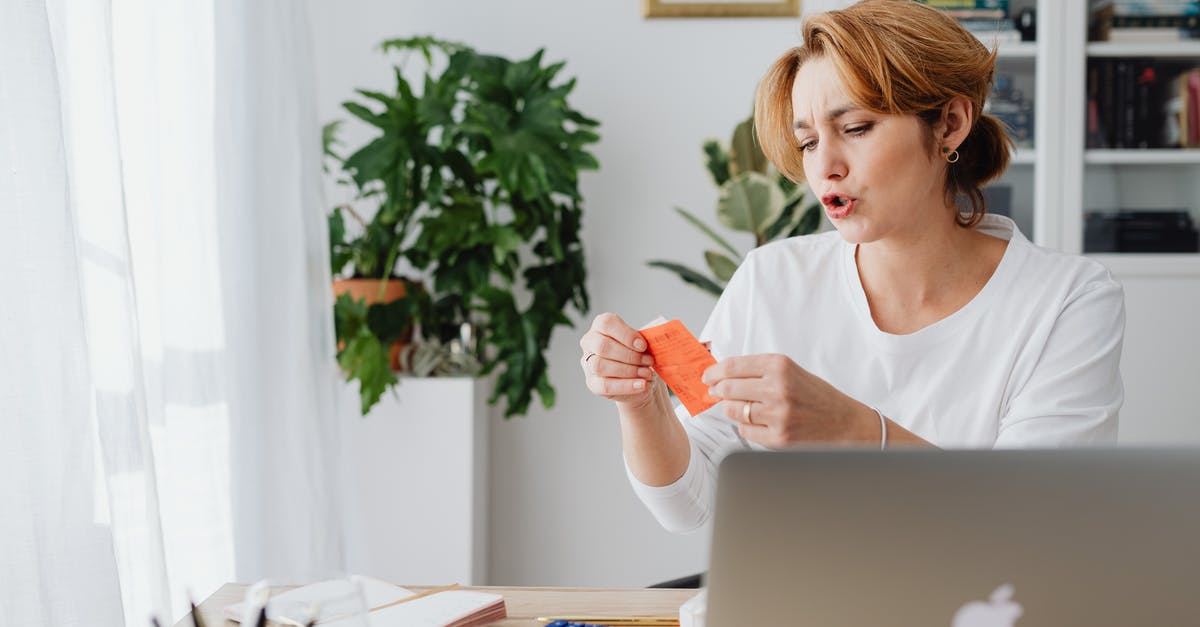 Acceptance of USD bills [duplicate] - Woman in White Scoop Neck Shirt Using Silver Macbook