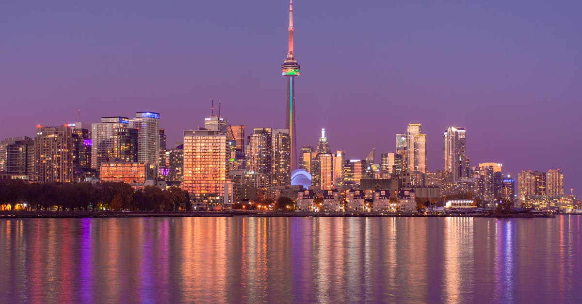 Accompanying friend for a Canada visa? - City Skyline during Night Time