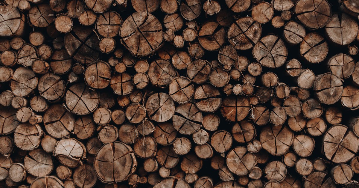 Activities in Ardennes, is there a resource or website? - Pile of wooden skids with cracks stacked accurately in rows arranged for cutting