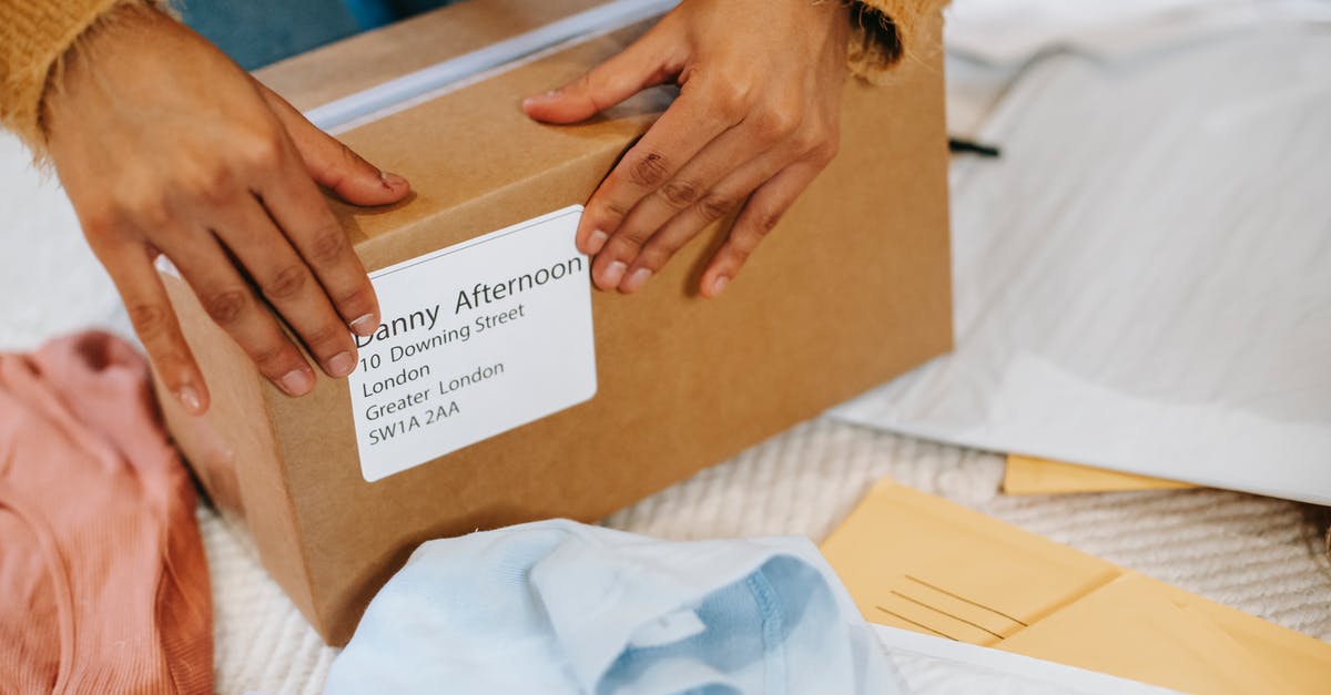 actual address is Different from the billing address on my ticket - Woman preparing box with parcel for sending