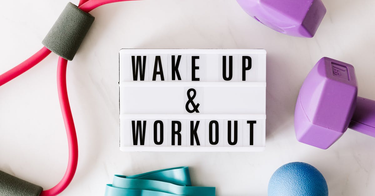 Actual enforcement of carry-on luggage weight [closed] - Wake up and workout title on light box surface surrounded by colorful sport equipment