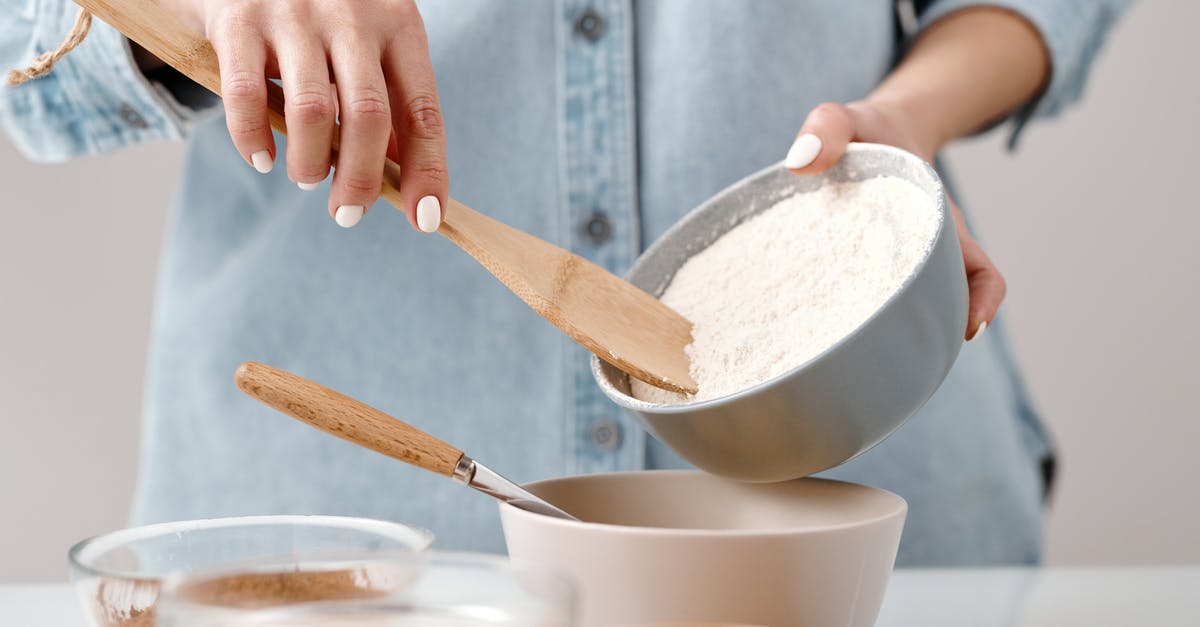 Adding baggage allownce - Person Adding Flour into a Bowl