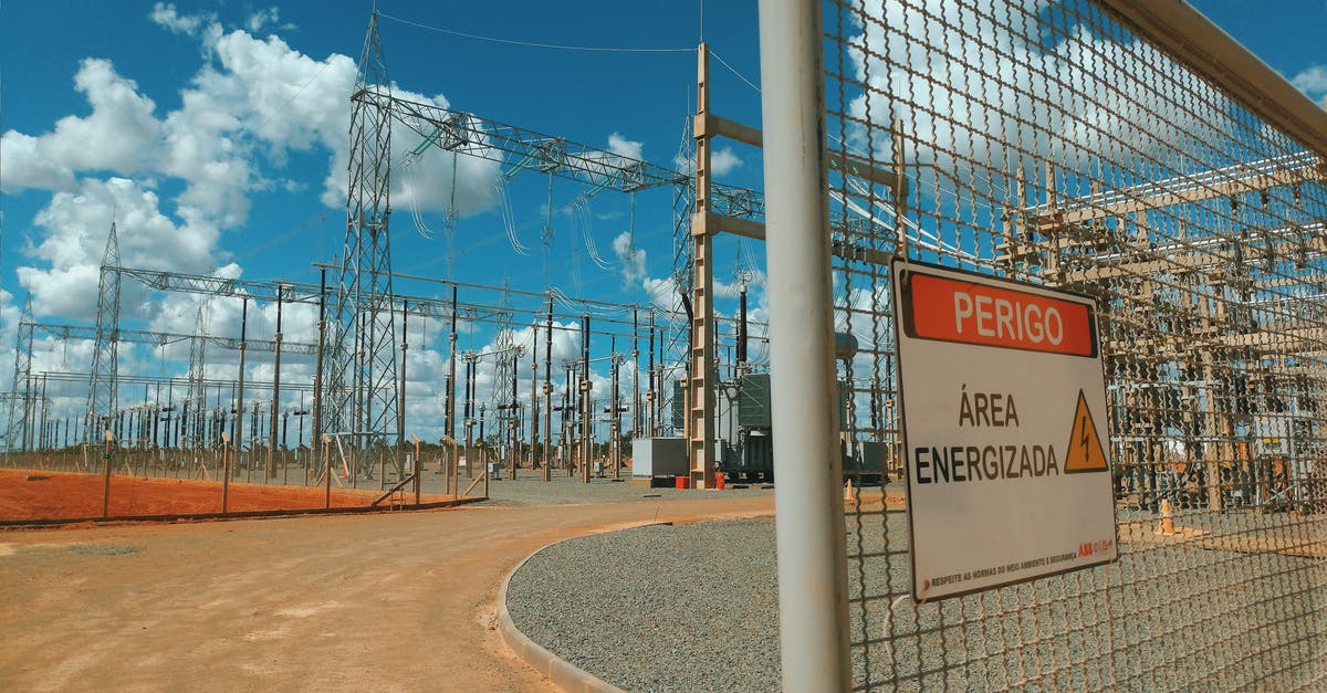 Adding luggage during a layover without exiting the secure area [duplicate] - High voltage substation located behind metal fence in daylight