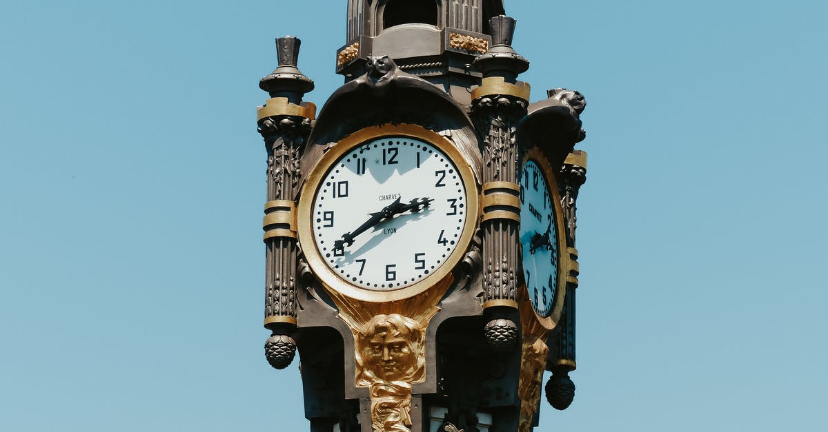 Aer Lingus Stopover with no time at destination - Classic clock in clear blue sky