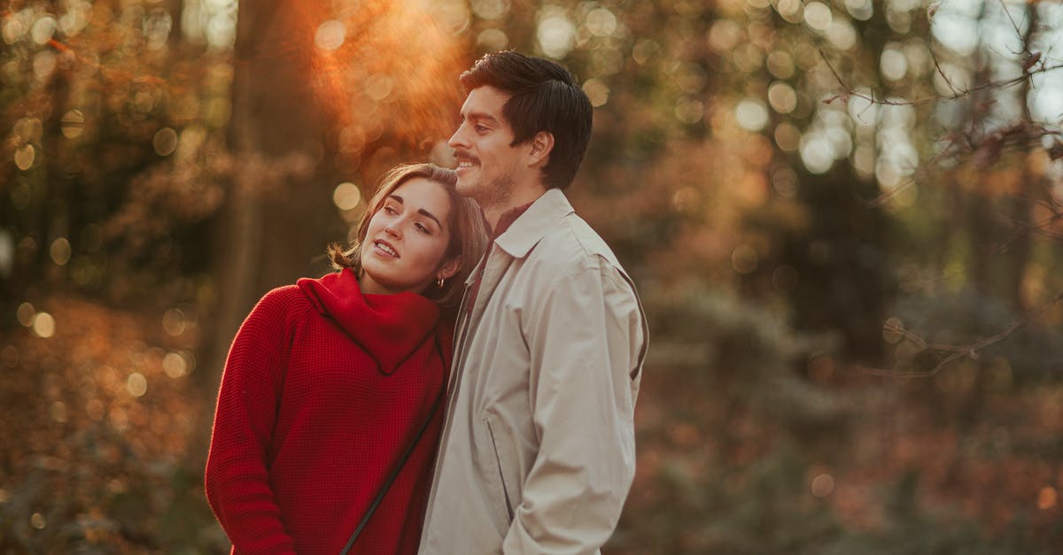 Affordable stay options in / near SF in September 2015 [closed] - Loving girlfriend leaning on boyfriends shoulder while standing in nature and looking into distance with trees on blurred background with lens flare