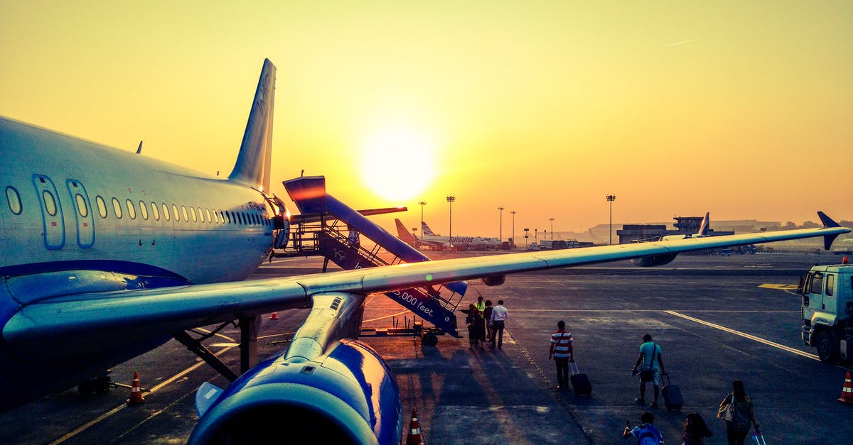 Air Canada luggage allowance when flying from Europe to USA - Photography of Airplane during Sunrise