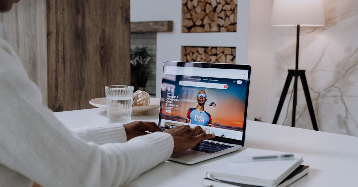 Airbnb and justify of expenses - Person in White Long Sleeve Shirt Using Macbook Pro