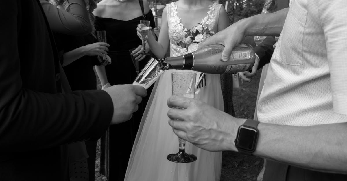 Airbnb guests meaning - Grayscale Photo of Man and Woman Holding Hands