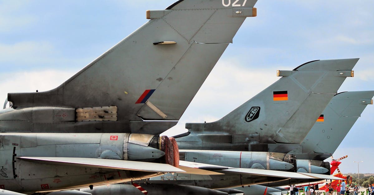 Airport in Japan without Retina Scan - Gray Fighter Plane on Airport