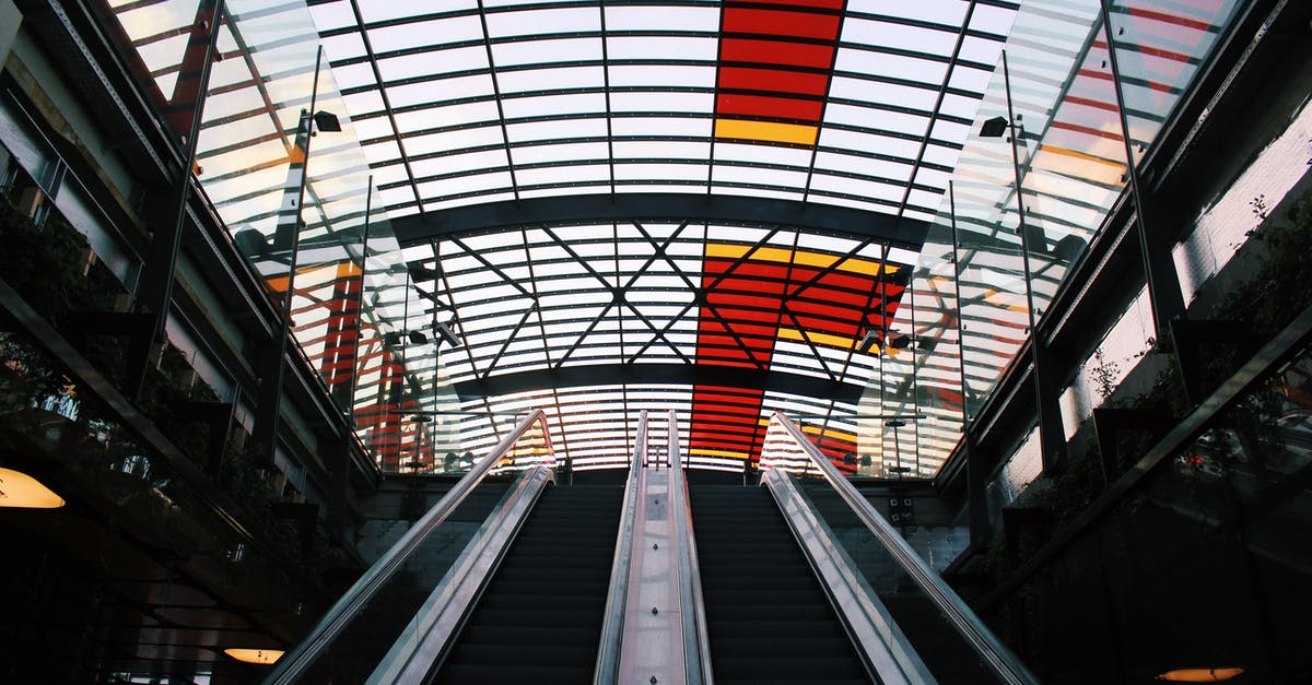 Airport transit in Amsterdam - Architectural of Silver and Black Building