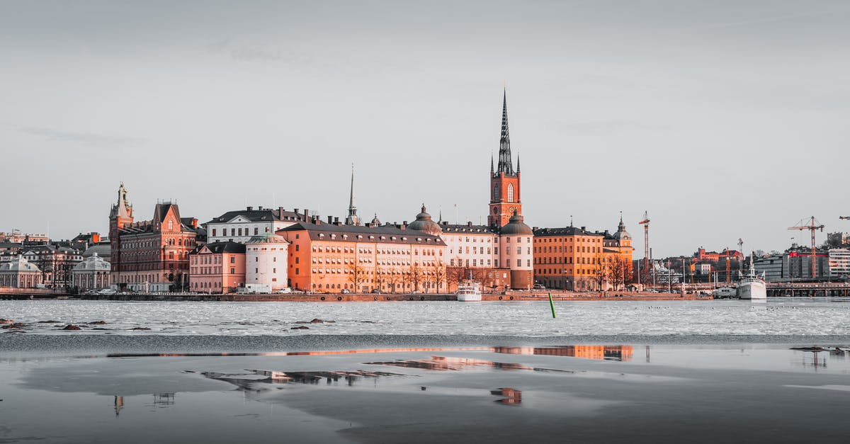 Airports near Stockholm - Brown and White Concrete Building Under Gray Sky