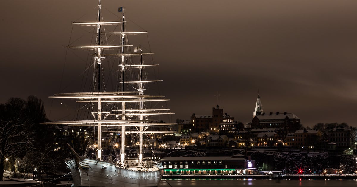 Airports near Stockholm - White Ship on Port at Night