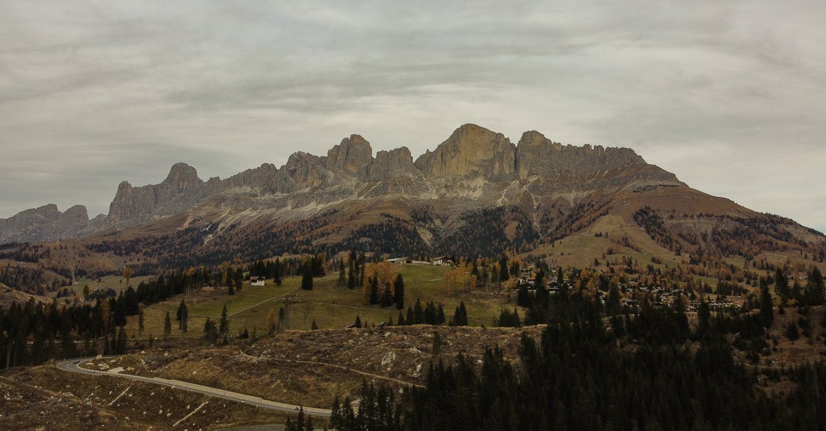 Albania to Italy with interrail pass - Green Trees and Brown Mountains Under White Clouds and Blue Sky