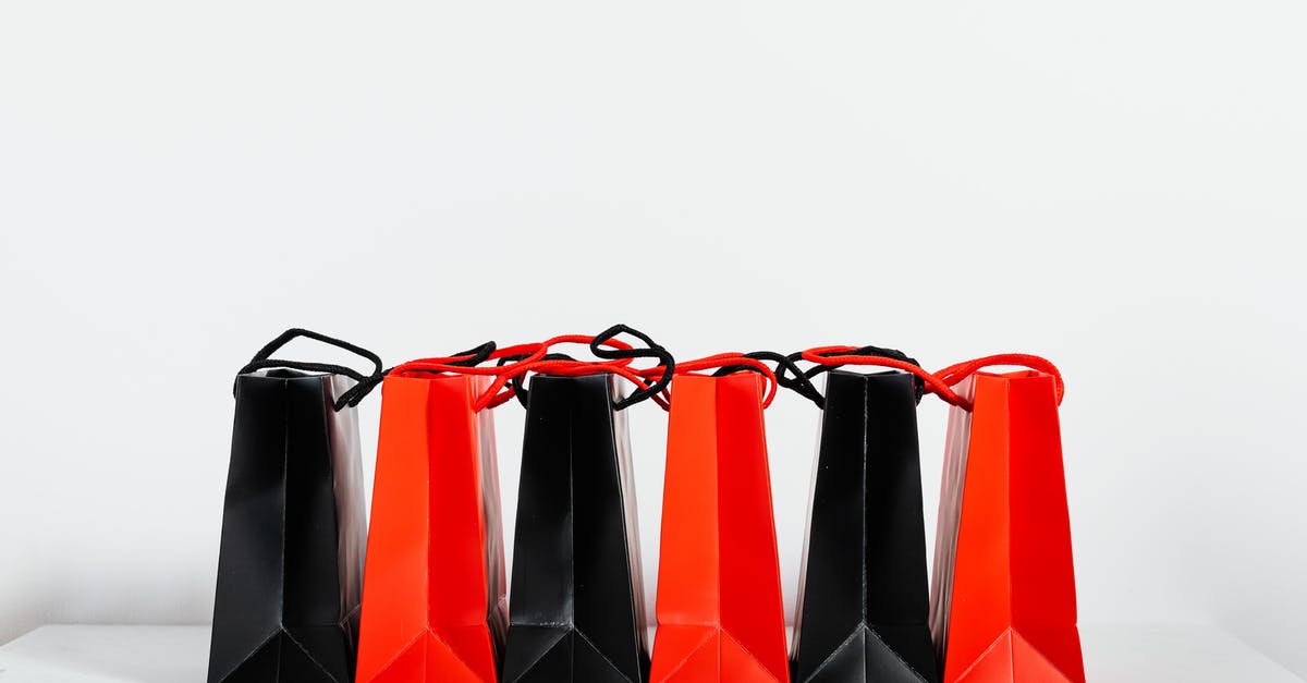 Alternate routes Almaty to Novosibirsk - Black and Red Paper Bags on White Background