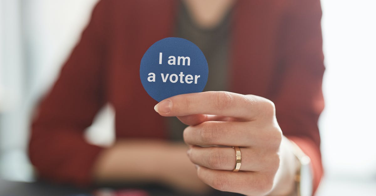 Am I allowed to own a foreign flag? [closed] - A Person Holding a I Am a Voter 