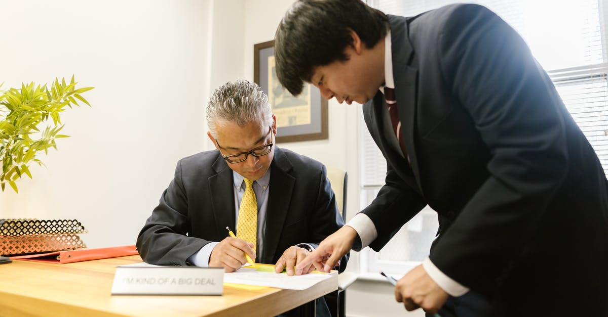 Am I over-staying in the Philippines? Japanese Dual citizen - A Man Showing his Boss a Document