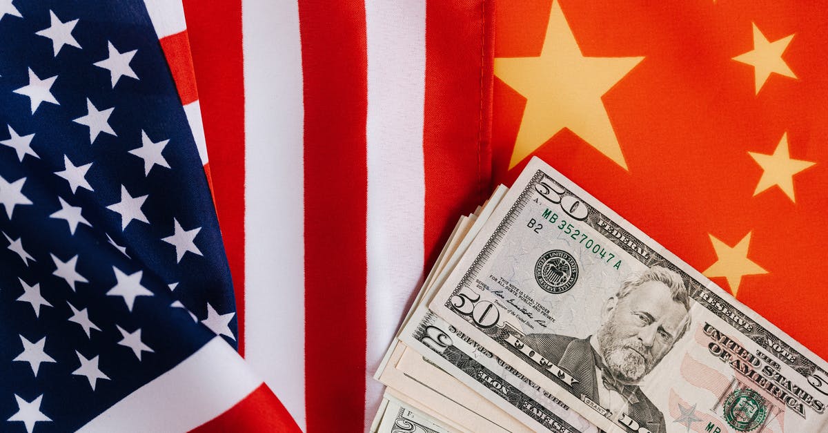 American in Europe: can I avoid import fees? - American and Chinese flags and USA dollars