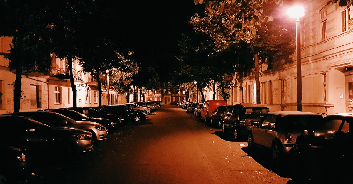 Amsterdam to Berlin - Hire Car - Assorted Cars Parking on Street during Nighttime