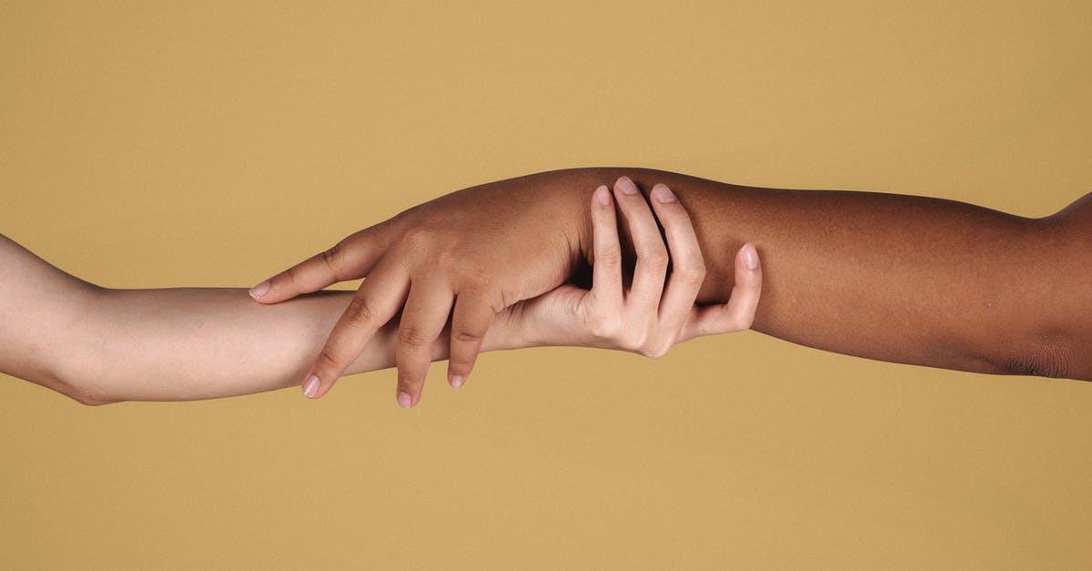 Amtrak Code-share with United Airlines [closed] - Diverse women showing respect to each other while holding hands