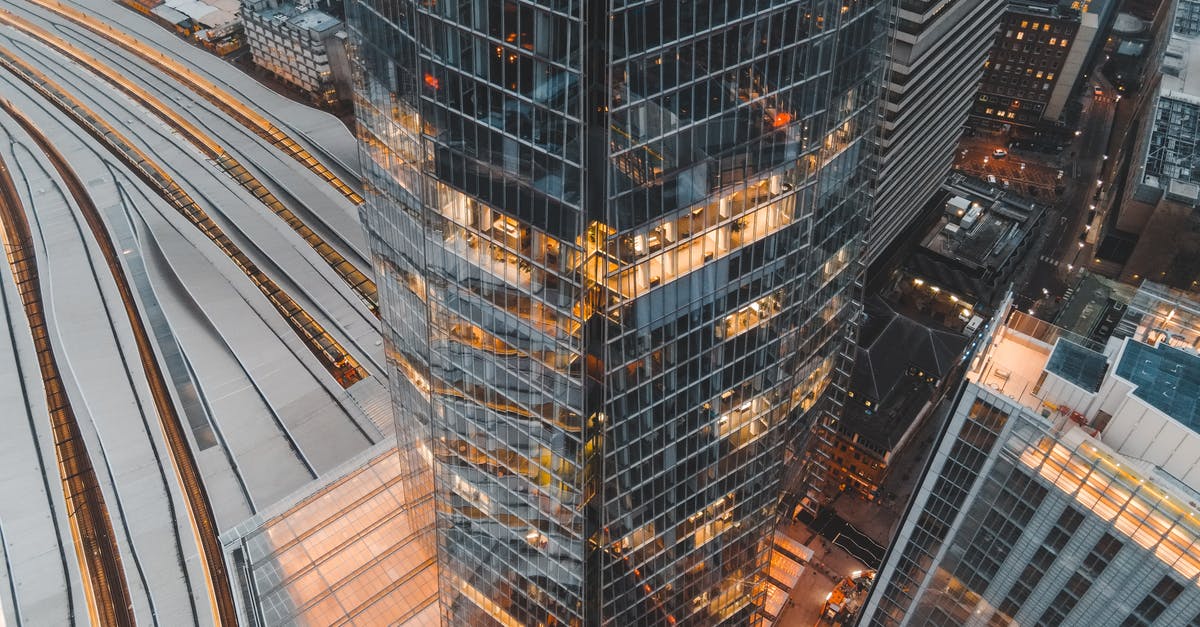 Any cash machine in central London which can dispense £5? - Drone view of London city located in England with tall Shard skyscraper near buildings and railways in daytime