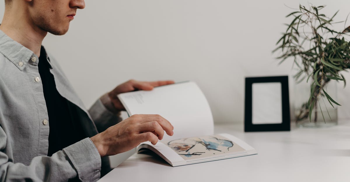 Any coworking space in Nicosia, Cyprus? - Man in Black Suit Holding White Printer Paper