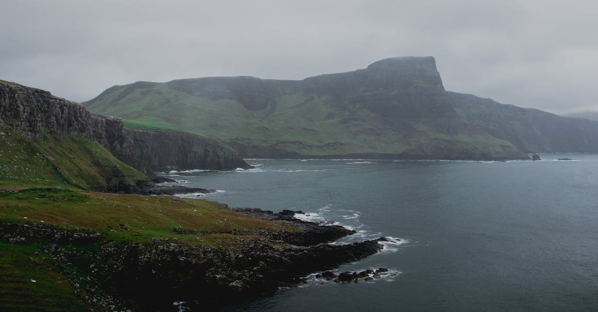 Any distinction between UK Visa sticker and UK Entry Clearance sticker? - Green Mountain Beside Body of Water