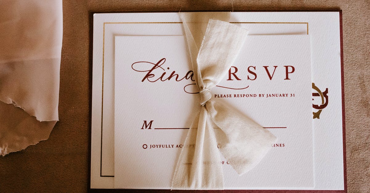 Any special requirements in driving from Spain to France? - Invitation card with the inscription tied with ribbon
