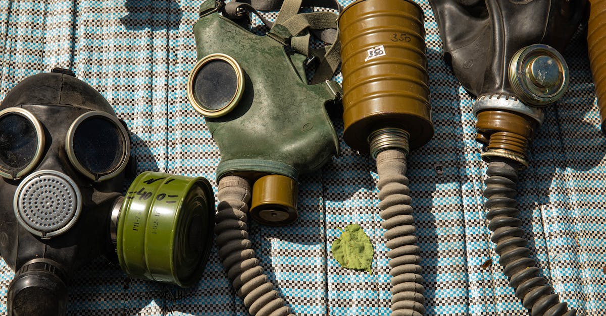 Any suggestions to ensure safety while hitchhiking? - Green and Black Gas Mask