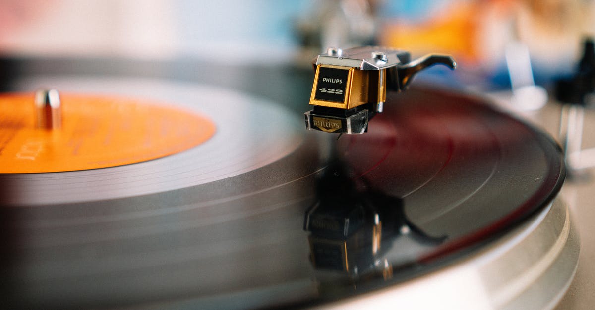 Apartment in Munich [closed] - Retro turntable playing vinyl disc in living room