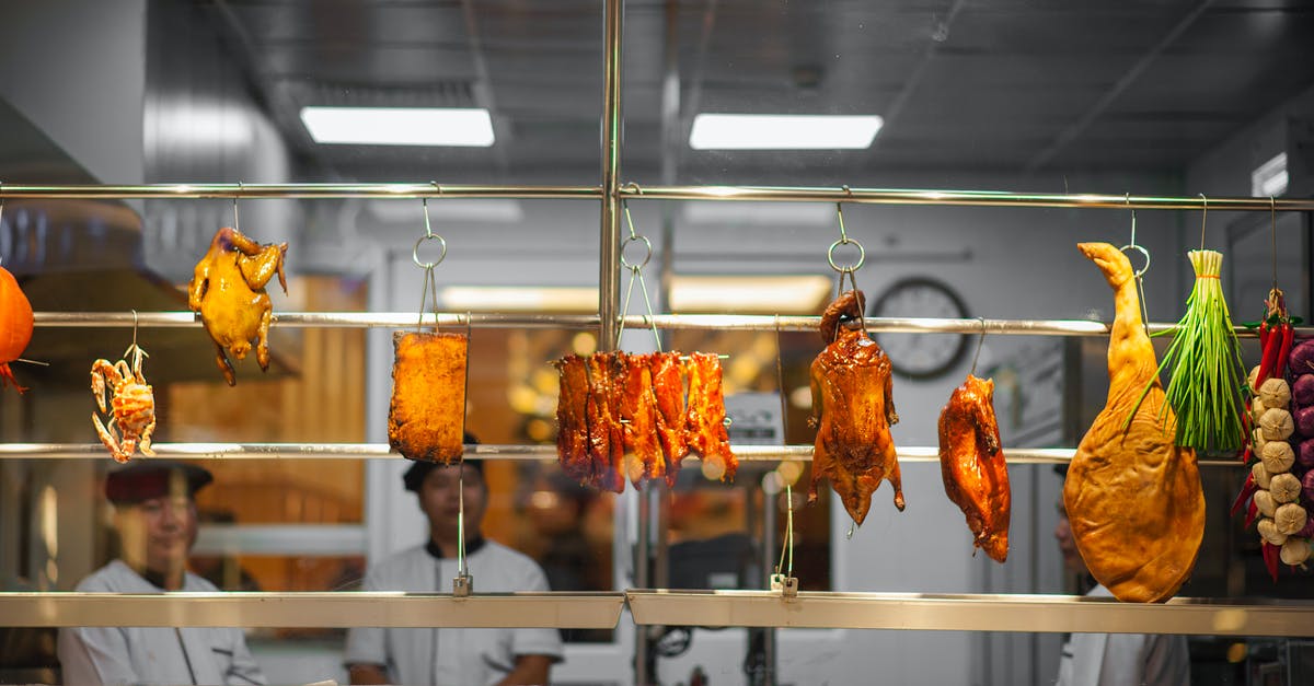 Apple Store in Ankara or Turkey - Photo of Assorted Food Hanging on Gray Metal Railings