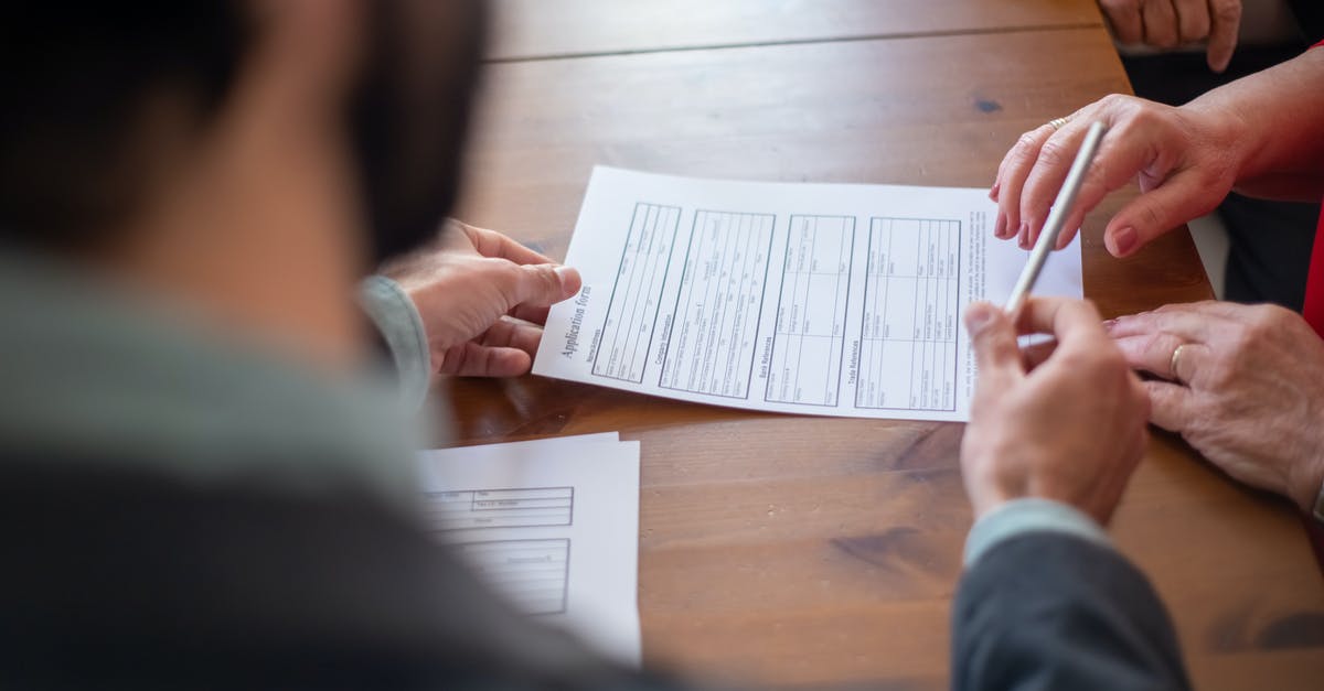 Application form for visitor visa to Malta - An Agent Handing a Pen to a Client