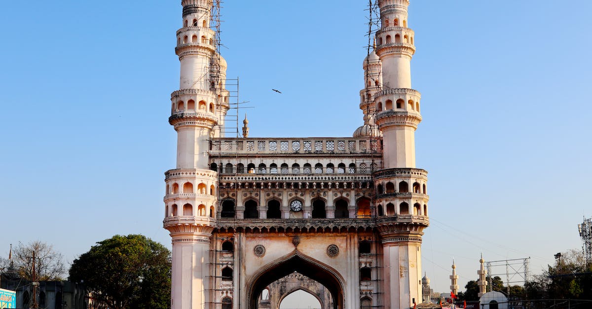 Apply for India visa but not effective immediately - People Walking Near Brown Concrete Building