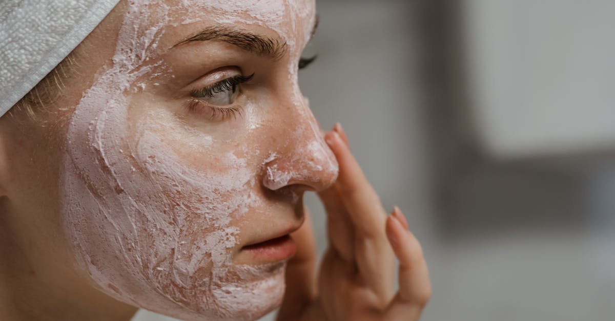 Applying for asylum at airport [closed] - Close-up Photo of a Woman Applying Facial Cream 