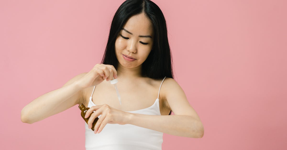Applying for Long stay visa as scientist - France with an I-20/EAD expiring soon [closed] - Woman in white tank top applying cosmetic product to her hand