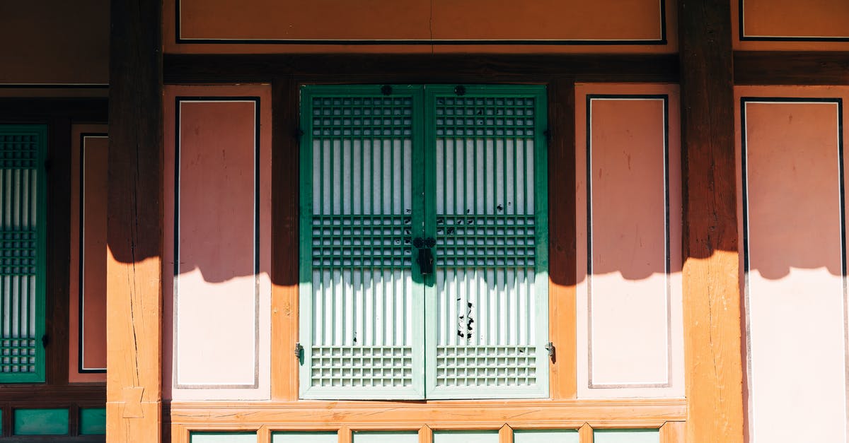 Applying for South Korean tourist visas - Front Of A House With Green Wooden Window 